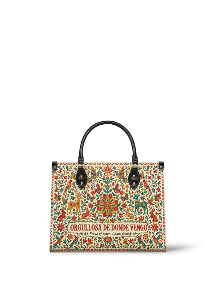Cream handbag with all over folk embroidery, a large brick red flower at the centre surrounded by deer, rabbits, birds and butterflies