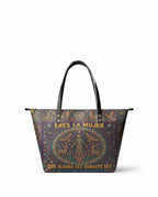 "Eres la mujer que alguna vez soñaste ser" ver.8 Leather Tote Bag - front view | Paleta Bags