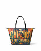 "Mi cultura es mi fortaleza" ver.2 Leather Tote Bag - front view | Paleta Bags