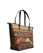 "De las manos de nuestras abuelas a las nuestras" ver.3 Leather Tote Bag - side view | Paleta Bags