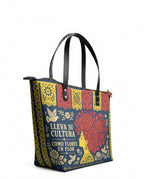 "Lleva su cultura como flores en flor" ver.2 Leather Tote Bag - side view | Paleta Bags