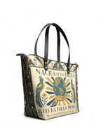 "Nacida de la tierra, hecha para el mundo" ver.2 Leather Tote Bag - side view | Paleta Bags