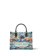 "Soy agua fluyo, me adapto, persisto" ver.1 Leather Handbag - front view | Paleta Bags