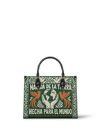 "Nacida de la tierra, hecha para el mundo" ver.3 Leather Handbag - front view | Paleta Bags