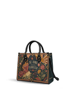 "Se amó hasta florecer" ver.1 Leather Handbag - side view | Paleta Bags