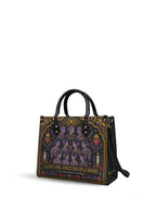 "Llevo a mis ancestros en la sangre" ver.3 Leather Handbag - side view | Paleta Bags