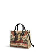 "El dolor me enseñó a ser fuerte" ver.3 Leather Handbag - side view | Paleta Bags
