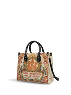 "Llevo a mis ancestros en la sangre" ver.5 Leather Handbag - side view | Paleta Bags
