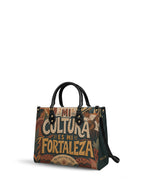 "Mi cultura es mi fortaleza" ver.1 Leather Handbag - side view | Paleta Bags