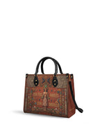 "Usa tus raíces con orgullo" ver.1 Leather Handbag - side view | Paleta Bags