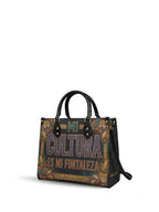 "Mi cultura es mi fortaleza" ver.3 Leather Handbag - side view | Paleta Bags