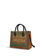 "Educada. Orgullosa. Imparable" ver.1 Leather Handbag - side view | Paleta Bags