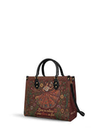 "Nacida de la tierra, hecha para el mundo" ver.5 Leather Handbag - side view | Paleta Bags