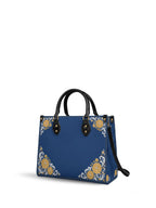 "CEMPASSÚCHIL" Leather Handbag - side view | Paleta Bags