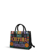 "Mi cultura es mi fortaleza" ver.4 Leather Handbag - side view | Paleta Bags