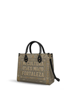 "Mi cultura es mi fortaleza" ver.5 Leather Handbag - side view | Paleta Bags