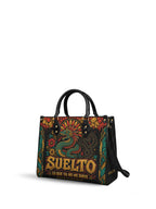 "Suelto lo que ya no me sirve" ver.2 Leather Handbag - side view | Paleta Bags