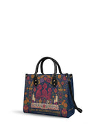 "Llevo a mis ancestros en la sangre" ver.1 Leather Handbag - side view | Paleta Bags