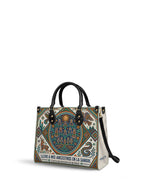 "Llevo a mis ancestros en la sangre" ver.4 Leather Handbag - side view | Paleta Bags