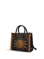 "Me levanto con el sol y llevo el fuego" ver.2 Leather Handbag - side view | Paleta Bags