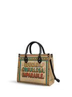 "Educada. Orgullosa. Imparable" ver.4 Leather Handbag - side view | Paleta Bags