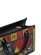 "Lleva su cultura como flores en flor" ver.2 Leather Handbag - detail | Paleta Bags