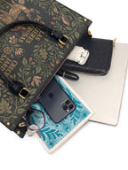 "Las mujeres poderosas crecen en jardines salvajes" ver.3 Leather Handbag - interior | Paleta Bags