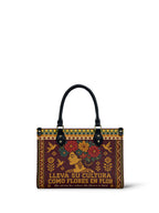 "Lleva su cultura como flores en flor" ver.4 Small Leather Handbag - front view | Paleta Bags