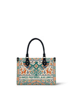 "Raíces profundas, alas libres" ver.4 Small Leather Handbag - front view | Paleta Bags