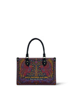 "Raíces profundas, alas libres" ver.1 Small Leather Handbag - front view | Paleta Bags