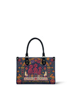 "Llevo a mis ancestros en la sangre" ver.1 Small Leather Handbag - front view | Paleta Bags
