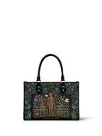 "Las mujeres poderosas crecen en jardines salvajes" ver.1 Small Leather Handbag - front view | Paleta Bags