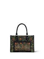 "Las mujeres poderosas crecen en jardines salvajes" ver.2 Small Leather Handbag - front view | Paleta Bags
