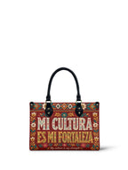 "Mi cultura es mi fortaleza" ver.6 Small Leather Handbag - front view | Paleta Bags