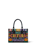 "Mi cultura es mi fortaleza" ver.4 Small Leather Handbag - front view | Paleta Bags