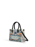 "Soy agua fluyo, me adapto, persisto" ver.1 Small Leather Handbag - side view | Paleta Bags