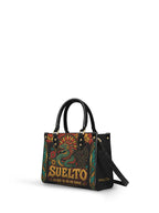 "Suelto lo que ya no me sirve" ver.2 Small Leather Handbag - side view | Paleta Bags