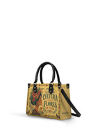 "Lleva su cultura como flores en flor" ver.1 Small Leather Handbag - side view | Paleta Bags