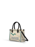 "Suelto lo que ya no me sirve" ver.4 Small Leather Handbag - side view | Paleta Bags