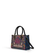 "Llevo a mis ancestros en la sangre" ver.1 Small Leather Handbag - side view | Paleta Bags
