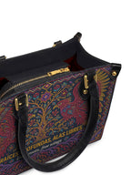 "Raíces profundas, alas libres" ver.1 Small Leather Handbag - detail | Paleta Bags