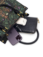 "Las mujeres poderosas crecen en jardines salvajes" ver.1 Small Leather Handbag - interior | Paleta Bags