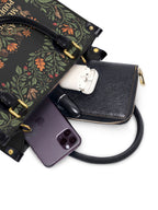 "Las mujeres poderosas crecen en jardines salvajes" ver.2 Small Leather Handbag - interior | Paleta Bags