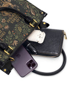 "Las mujeres poderosas crecen en jardines salvajes" ver.3 Small Leather Handbag - interior | Paleta Bags